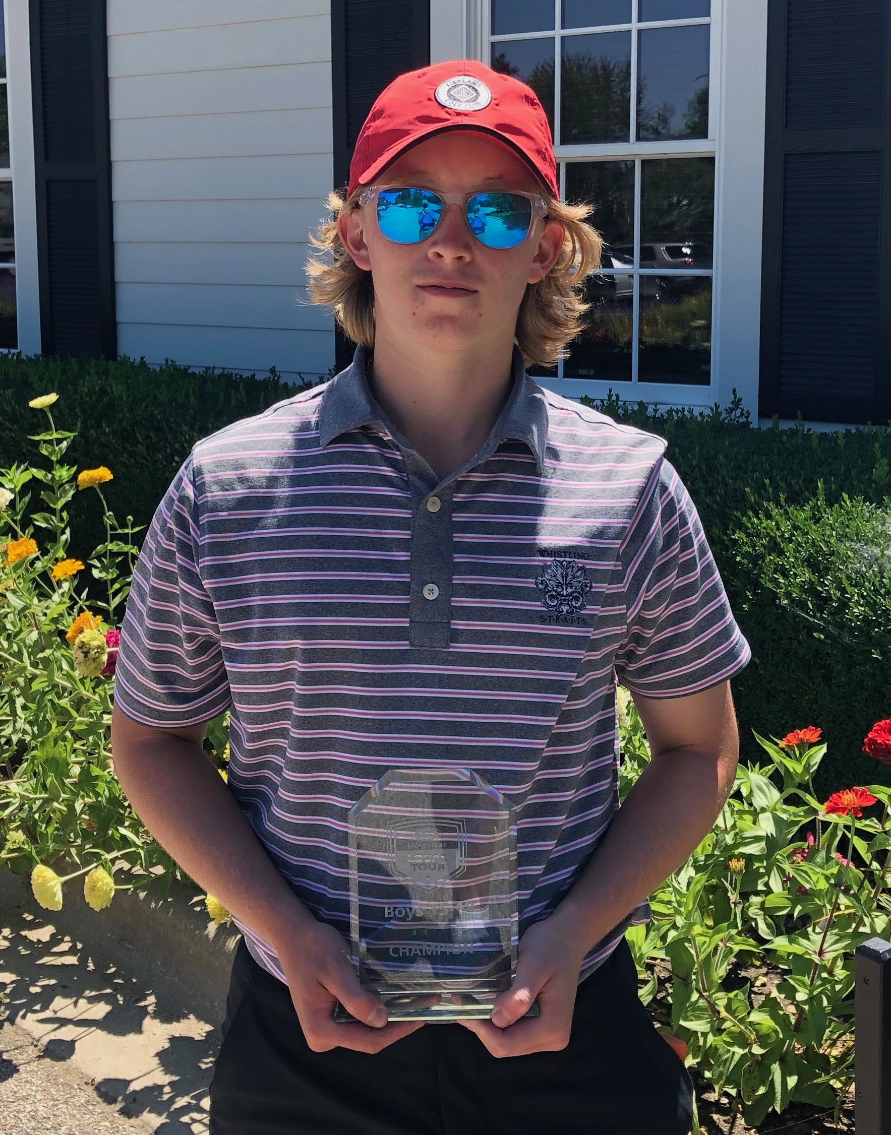 Pictured: Parker Bigornia with the trophy following his win